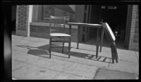 Bridge table set sits in front of the offices of the H. H. West Company on Omar Avenue, Los Angeles, 1946