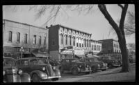 View of the east side of the town square (including the old Rynearson opera house), Red Oak, 1946