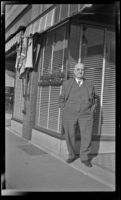 Dr. William S. Reiley poses outside his office, Red Oak, 1946