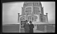H. H. West and Mertie West pose in front of the Bahá’í Temple, Wilmette, 1946