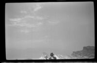 Mertie West and H. H. West pose at Zabriskie Point, Death Valley National Park, 1947