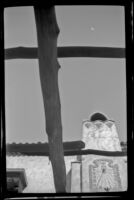 Sundial on a courtyard wall at Scotty's Castle, viewed from below, Death Valley National Park, 1947