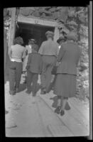 Mertie West and other visitors enter the Ryan Borax Mine, Death Valley National Park vicinity, 1947