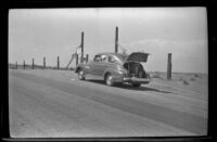 Car stopped along the roadside, Barstow vicinity, 1947