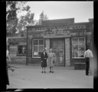 Mertie West and Mrs D. L. Tribe stand in front of the Wells, Fargo & Co's Express office at Knott's Berry Farm, Buena Park, 1947