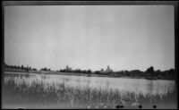 View looking across Lost Lagoon in Stanley Park towards Vancouver, Vancouver, 1947