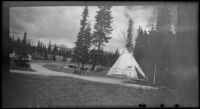 Tipi standing on the Chateau Lake Louise grounds near the horse corral, Lake Louise, 1947