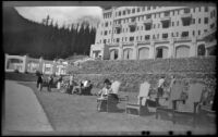 Mertie West sits in a chair on a lawn at the Chateau Lake Louise, Lake Louise, 1947