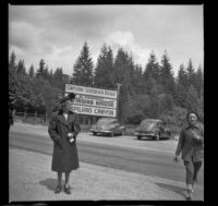 Mertie West stands outside the Capilano Suspension Bridge park, Vancouver, 1947