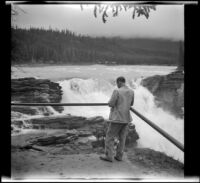Athabasca Falls and sightseer, Jasper National Park, 1947