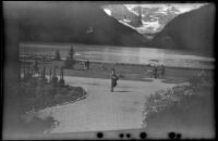 Mertie West poses on the walkway in front of Lake Louise, Lake Louise, 1947