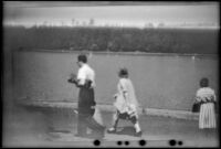 People walk past a lake in Stanley Park, Vancouver, 1947