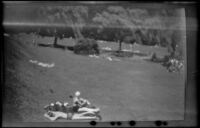 People relax on a lawn in Stanley Park, Vancouver, 1947