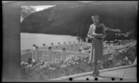Mertie West poses on a terrace near the swimming pool at Chateau Lake Louise, Lake Louise, 1947