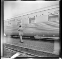 Railroad car on the Pullman Hotevilla train sits on the tracks, Albuquerque, 1947