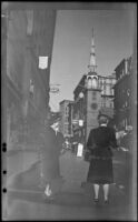 Mertie West and another woman stand down the street from Old South Meeting House, Boston, 1947