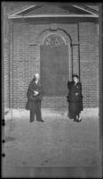 H. H. West and Mertie West pose beside a tablet in Paul Revere Mall, Boston, 1947