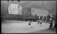 Ice skaters skate on the ice rink at Rockefeller Center, New York, 1947