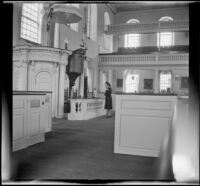 Mertie West reading a sign posted at the pulpit in Old South Meeting House, Boston, 1947