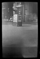 Policeman stands in a box and directs traffic, Boston, 1947