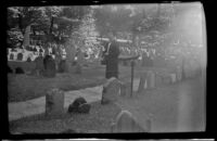 Mertie West poses while visiting Granary Burying Ground, Boston, 1947