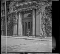 Mertie West approaches the Peabody Museum, Cambridge, 1947