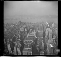View from Empire State Building looking down on Pennsylvania Station, General Post Office Building and Hudson River, New York, 1947