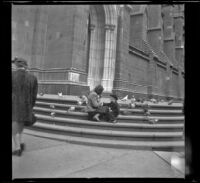 Pigeons on steps of St. Patrick's Cathedral, New York, 1947