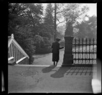 Mertie West going out of Fairmount Park Conservatory, Philadelphia, 1947