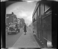 Mertie West on a passenger loading zone in the street, Washington, D.C., 1947