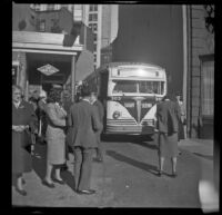 Tourists in front of a Gettysburg sight seeing bus, Washington, D.C., 1947