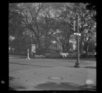 Mertie West at an intersection adjacent to the White House, Washington, D.C., 1947