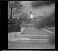 H. H. West in front of the fountain next to the main entrance to the National Gallery of Art, Washington, D.C., 1947