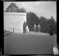 H. H. West poses beside the southern face of the Tomb of the Unknown Soldier, Arlington, 1947