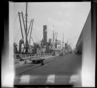 Ships moored alongside a dock, New Orleans, 1947