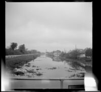 Open canal in the city, viewed from a bridge, New Orleans, 1947