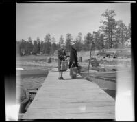 Mertie West and Agnes Whitaker pose as they leave the dock, Big Bear Lake, 1948