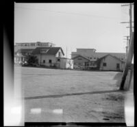 Cottages on Mildred Avenue, viewed from across a parking lot, Venice, 1948