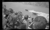 Motorboats cruise past the S. S. Catalina during its approach to Avalon, Santa Catalina Island, 1948