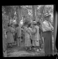 Mrs. Hiatt mingles with other Iowa State Picnic attendees in Lincoln Park, Los Angeles, 1948