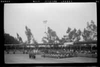 Bandstand and color guard at Knott's Berry Farm during a visit of H. H. West, Buena Park, 1956