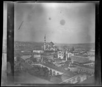 View of a town with a mosque in the distance, Turkey, 1895