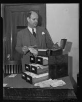 Charles Griffen combs through telegraphic bets for an investigation, Los Angeles, 1936