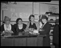 Mrs. George P. Griffith, Mabel Frankenfield, Florence O. Hunt, and Mrs. H.G. Raymond at the Children's Hospital Salvage Shop, Los Angeles, 1936