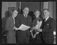 Kate Wakeling, Walter Ripley Jacobs, Rosemonde Rae Wright, and Robert Milton Byrne advocate for animal welfare, Los Angeles, 1936