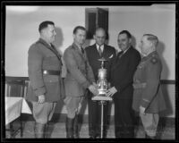 Colonel Harcourt Hervey, Captain John K. Miller, Oscar A. Trippet, Roy S. Stockton, and Brigadier General Walter P. Story with the Mayor's Trophy for marksmanship, Los Angeles, 1936