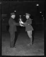 Roy S. Stockton presenting the Mayor's Trophy for marksmanship to Captain Harold E. Hopping, 160th infantry regiment, Los Angeles, 1936