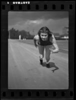 Marguerite Caswell practices her sprint, Los Angeles, 1936