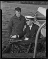 Captain Edward Hyde and Ray Ellis help stop poachers, Newport Beach, 1935