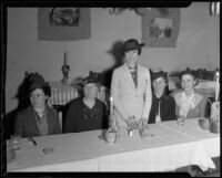 Unidentifed woman, Laura Cooley, Ann Sumner, Elizabeth Scattergood, and Albertina Rodi at a meeting of Ebell Club Juniors, Los Angeles, 1936